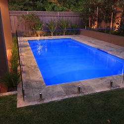 "Provincial" medium inground fibreglass swimming pool design, pictured in backyard