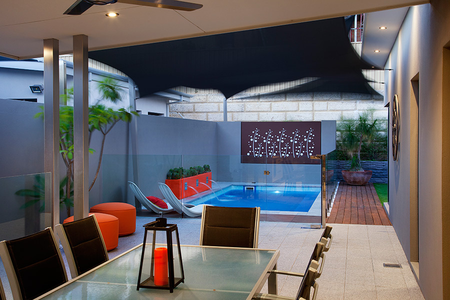 Stunning backyard setting with courtyard and swimming pool