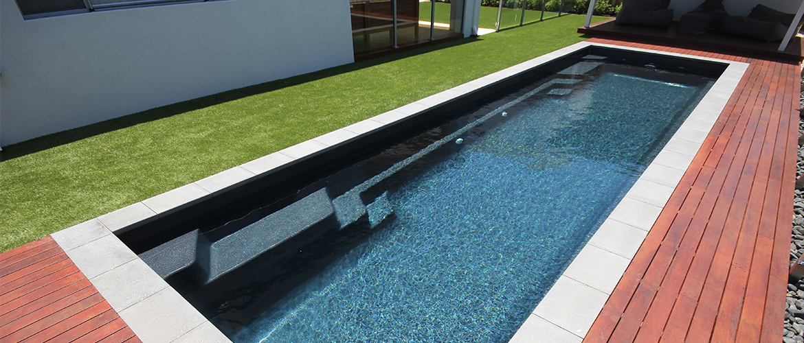 "Duchess" Large Fibreglass Pool Design in Perth, pictured as backyard pool, in "midnight storm" pool colour